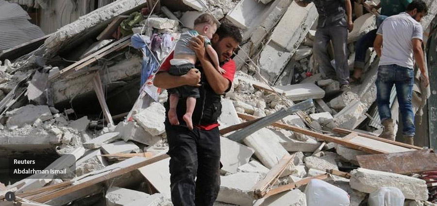 Child being rescued in Aleppo