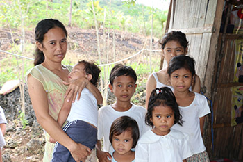 Mother in the Philippines and her children