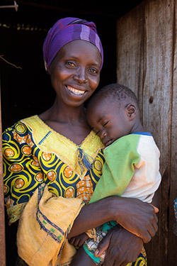 Woman in Rwanda holding baby